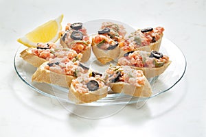 salmon tartare with capers and black olives