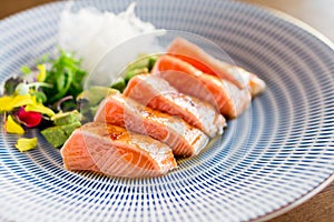 Salmon tataki dinner close-up.