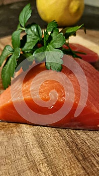 Salmon Trout Fillets on Wooden Board