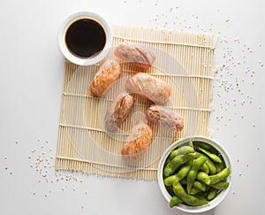 Salmon and tuna fish nigiri set on the white background