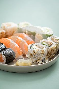 Salmon and tuna sushi mix plate with Nigiri, Maki and inside out California rolls