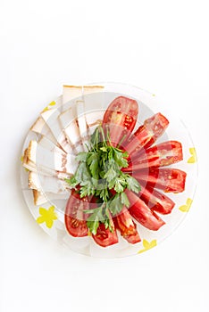 Salo tomatoes parsley onion and garlic on the table