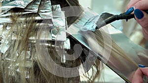 Salon dyeing hair beauty foil caucasian beautiful young women hairdresser, for person aluminum from stylist and bleach