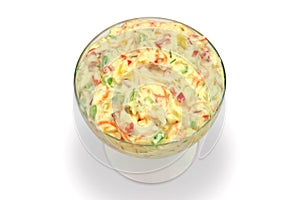 Salpicão sauce on a bowl, brazilian tradition and barbecue accompaniment, white background, clipping path included.
