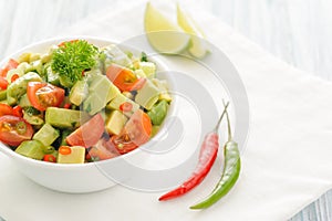 Salsa from avocado, cherry tomatoes and lime.