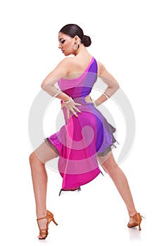 Salsa dancer with hands on hips photo