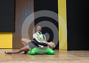 Salsa dancers in Internacional Festival of Salsa in Cali, Colombia green couple