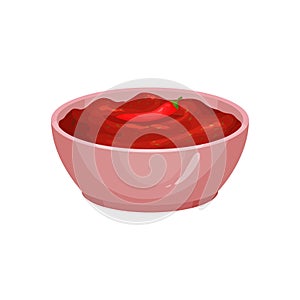 Salsa with red-hot chili pepper in ceramic dip bowl. Traditional piquant sauce of Mexican cuisine. Thick spicy liquid