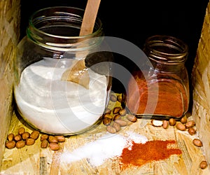 Salt and cayenne pepper in jars