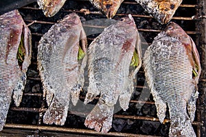 Salt-Crusted Grilled Fish in the local market of Thailand
