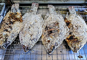 Salt crusted grilled Tilapia on the grill, Special Menu for Thai People - Thai Food