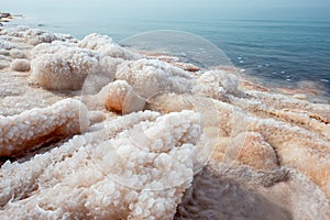 Salt at the Dead Sea beach. Jordan.