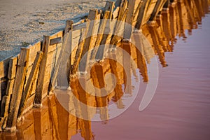 Salt evaporation lake shores. An industrial salt plant produces - natural sea salt