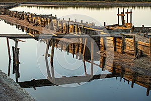 Salt evaporation lake shores. An industrial salt plant produces - natural sea salt