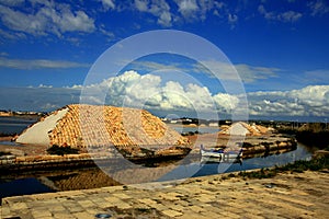 Salt heaps covered terracotta, Trapani photo