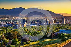 Salt Lake City skyline at sunset with Wasatch Mountains in the background, Utah