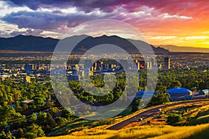 Salt Lake City skyline at sunset with Wasatch Mountains in the background, Utah