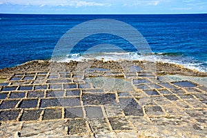 Salt pans along Marsalforn coastline, Gozo.