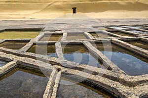Salt pans located near Qbajjar on the maltese Island of Gozo. Detailed view on pans