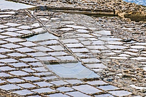 Salt pans near Qbajjar in Gozo, Malta.