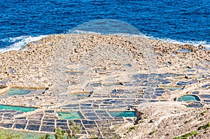 Salt pans near Qbajjar in Gozo, Malta.