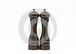 Salt and pepper mill, wooden cruet set white background full depth of field