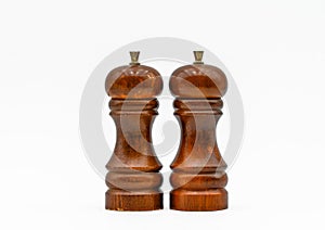 Salt and pepper mill, wooden cruet set white background full depth of field