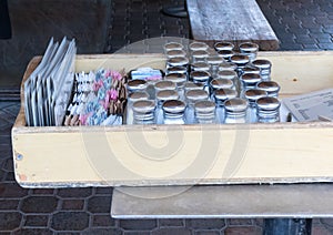 Salt and pepper, sugar and menus, restaurant tray