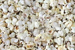 Salt Popcorn Texture Abstract Background. Big amount of pop corn