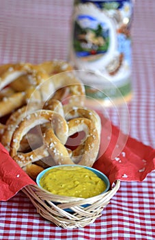 Salt Pretzels with Mustard Beer Stein on Red Checker Tablecloth