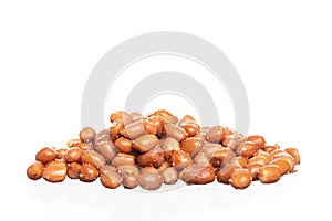 Salt roasted peanuts isolated on white