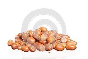 Salt roasted peanuts isolated on white