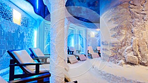 Salt room with armchairs in the spa