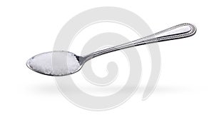 Salt in stainless steel spoon on white background