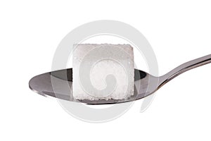 Salt or sugar on a teaspoon isolated