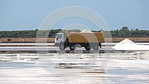 Salt transport in a loaded truck. Marine salt produced by the evaporation of seawater.