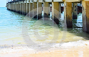 Salt Water Corrosion - Wear and Tear - Erosion and Damage in an Old Worn out Concrete Bridge over Sea Water