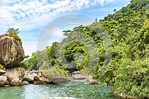 Salt water lagoon between the rocks and the preserved tropical forest