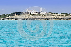 Salt windmill in Formentera turquoise sea