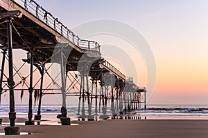 Saltburn pier and a golden sunrise. North Yorkshire.