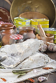 Salted cod cut on the table of the kitchen