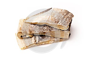 Salted codfish or salt cod isolated on a white background