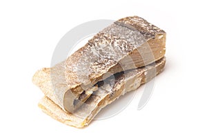 Salted codfish or salt cod isolated on a white background