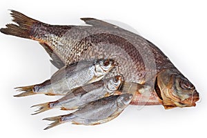 Salted and dried bream and roach fish on white background