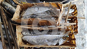 salted fish in a rattan container