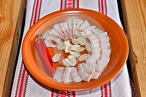Salted fresh lard (salo) and marinated red paper