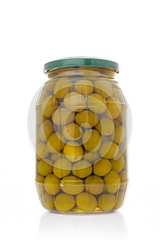 Salted green olives in glass jar. Isolated