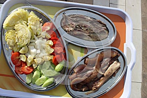 Salted herring fish and sardine. Green, cook and salad