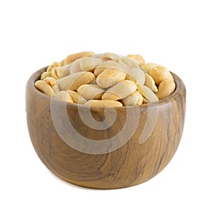 Salted peanuts in a wooden bowl
