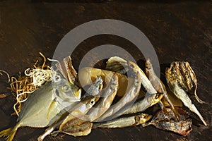 Salted smoked sea fish, dried squid in strips, vomer, capelin, blue whiting with pepper, squid lard, minke whale, herring.